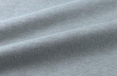 What is denim cloth generally used for (how is denim cloth woven)?